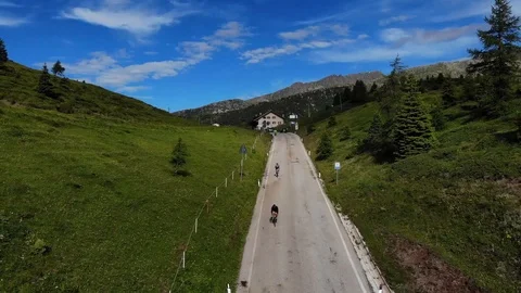 Two cyclists in the mountains Stock Footage 112332747