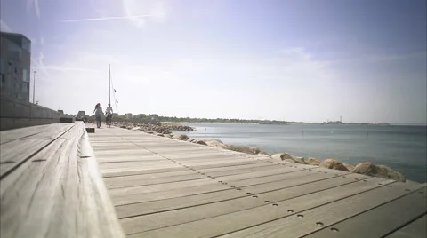 Two cyclists passing by, Malmo, Skane, Sweden. Stock Footage 51848312