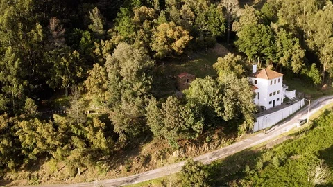 Two Cyclists Riding Down Empty Road In The Mountains Stock Footage 114573571