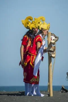 Two dancers are checking the masks before performing Stock Photos