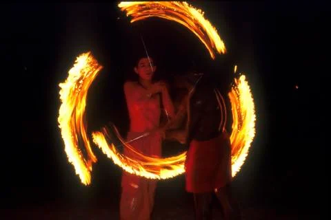 Two dancers during a fire dance tailand Stock Photos