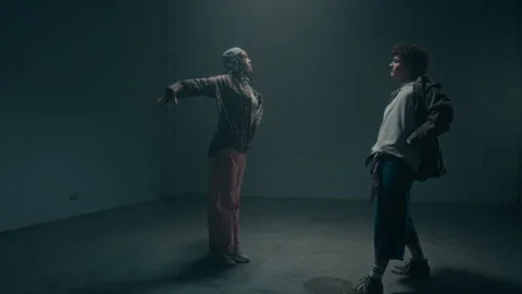 Two Dancers Facing each other during Dance Battle Stock Footage 335680891