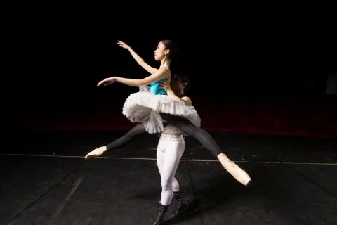 Two dancers practising, dragging. Stock Photos