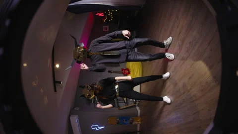 Two dancers record trending reels for followers. In halloween masks unknown Video stock 246994897