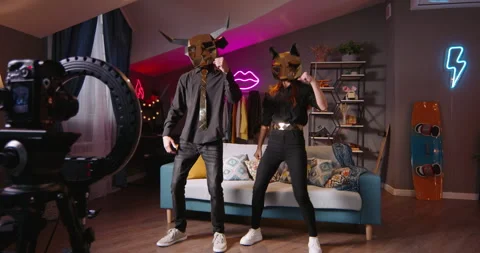 Two dancers record trending reels for followers. In halloween masks unknown Stock-Footage 246995207
