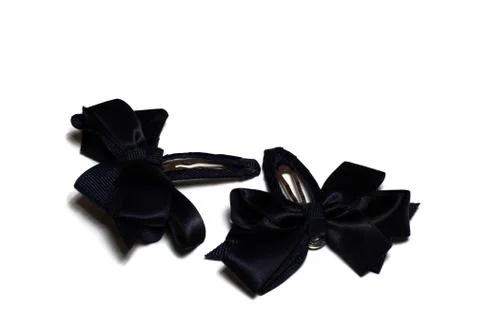 Two dark clips - bow Stock-Fotos