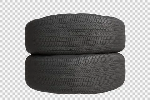 Two dark gray, seemingly new, automobile tires stacked neatly Stock Photos