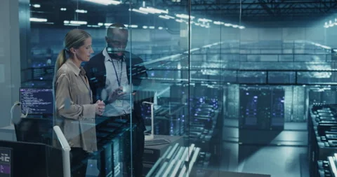 Two Data Center Engineers Using Laptop Computer Stock Footage 296173551