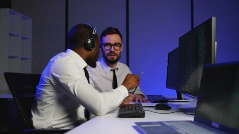 Two data center operators analyzing massive datasets Stock Footage 305014867