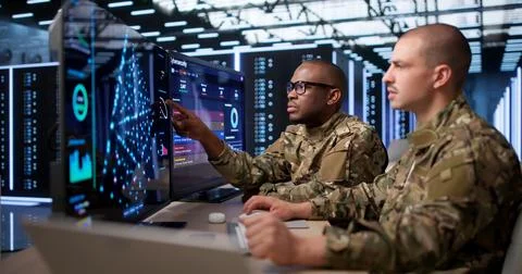 Two Data Scientists Study Deep Learning Models On Advanced AI Software. Foto stock