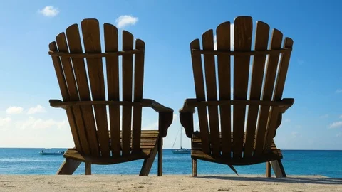 Two deckchairs on the beach of the Caribbean Stock Footage 102851046