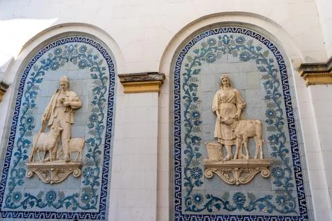 Two Decorative Architectural Bas Reliefs Depicting Rural Agriculture Shepherd Foto stock