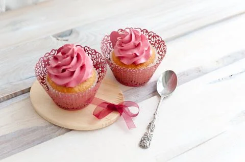 Two delicious cupcakes Stock Photos
