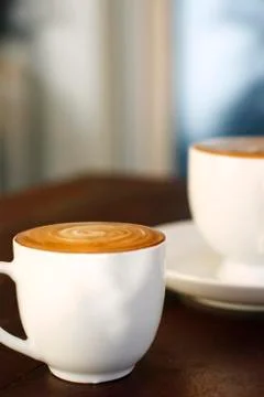 Two delicious lattes on a table. Foto stock