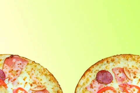 Two delicious pizzas on a yellow light green gradient Stock Illustration