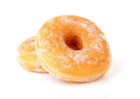 Two delicious sugared donuts Stock Photos