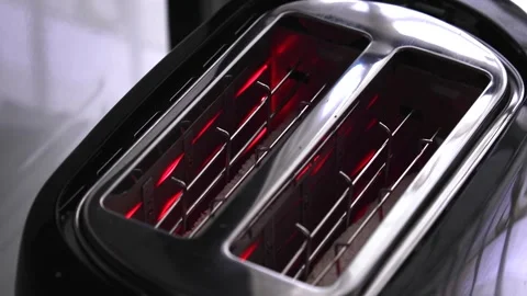 Two delicious toasted bread pop out of the toaster 스톡 동영상 289439881