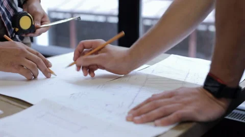 Two design engineers work with drawings Vídeo Stock 94649321