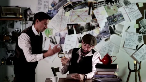 Two detectives argue while checking investigative records Stock Footage 120363908