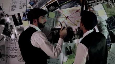 Two detectives at work Stock Footage 120364408