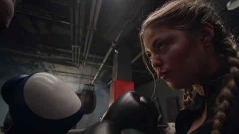 Two Determined Female Boxers Facing off in Ring before Match Stock Footage 340395224