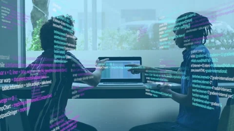 Two devs pointing at laptop while debugging, right dev initiating point, code Stock Footage 333526102