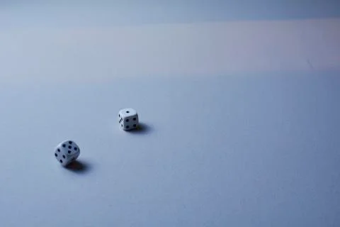 Two dice in motion, on white background, Stock Photos