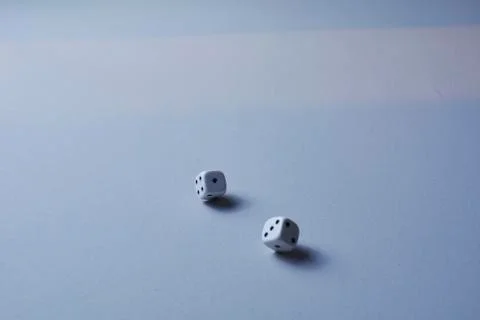 Two dice in motion, on white background, Stock Photos