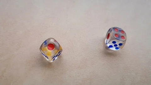 Two dice spin on the floor. (slow motion footage 960fps) Stock Footage 110984829