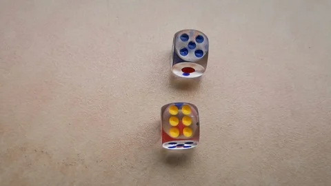 Two dice spin on the floor. (slow motion footage 960fps) Stock Footage 110984903