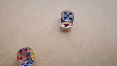 Two dice spin on the floor. (slow motion footage 960fps) Stock Footage 110984954
