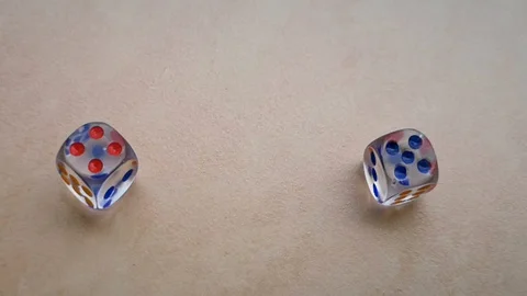 Two dice spin on the floor. (slow motion footage 960fps) Stock Footage 110985003