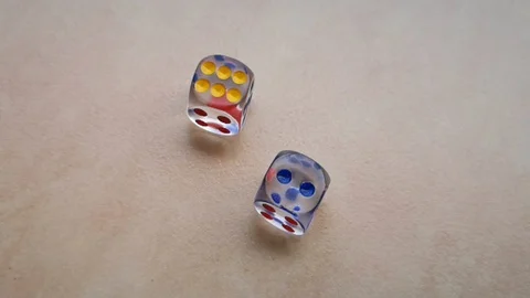 Two dice spin on the floor. (slow motion footage 960fps) Stock Footage 110985087