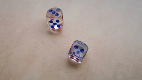 Two dice spin on the floor. (slow motion footage 960fps) Stock Footage 110985112