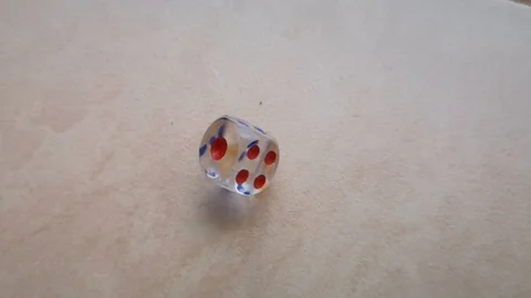 Two dice spin on the floor. (slow motion footage 960fps) Stock Footage 111632147