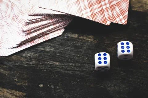 Two dice on the table Stock Photos