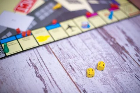 Two dices on wood table Stock Photos