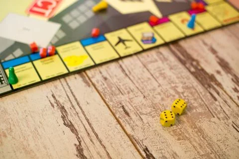 Two dices on wood table Stock Photos