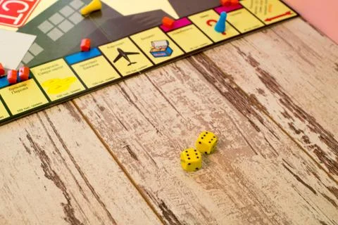 Two dices on wood table Stock Photos