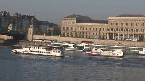 Two diesel driven sightseeing ships cruise on the Danube river Stockbeeldmateriaal 118984295