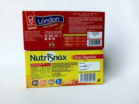 Two different brand boxes of oats digestive biscuits. Stock Photos