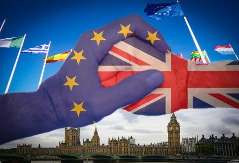 Two different fists fighting each other, Brexit concept Stock Photos