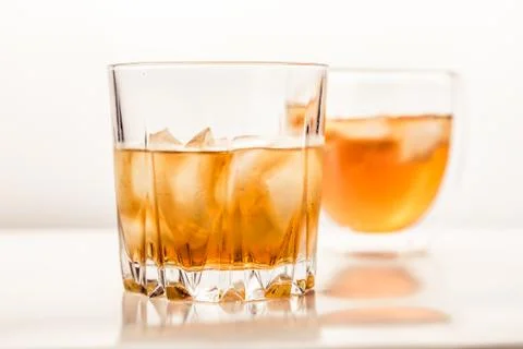 Two different glasses of whiskey Stock Photos
