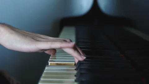 Two Different Hands on Piano Stock Footage 90117221