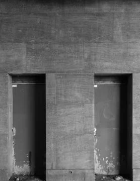 Two different paths behind the gray wall Stock Photos