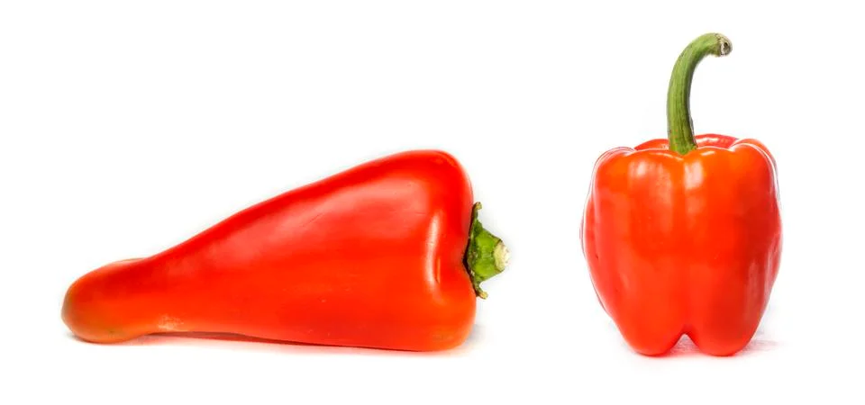 Two different red peppers Stock Photos