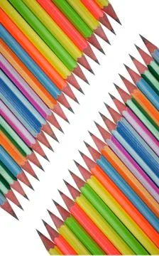 Two different rows of different colored wood pencil crayons facing each other Stock Photos