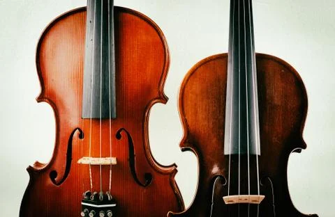 Two different size of violin put on background,show detail of front side, Stock Photos