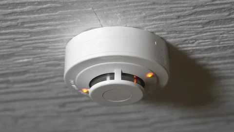 Two different smoke detectors Stock Footage