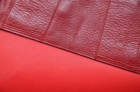 Two different sort of red artificial leather Stock Photos